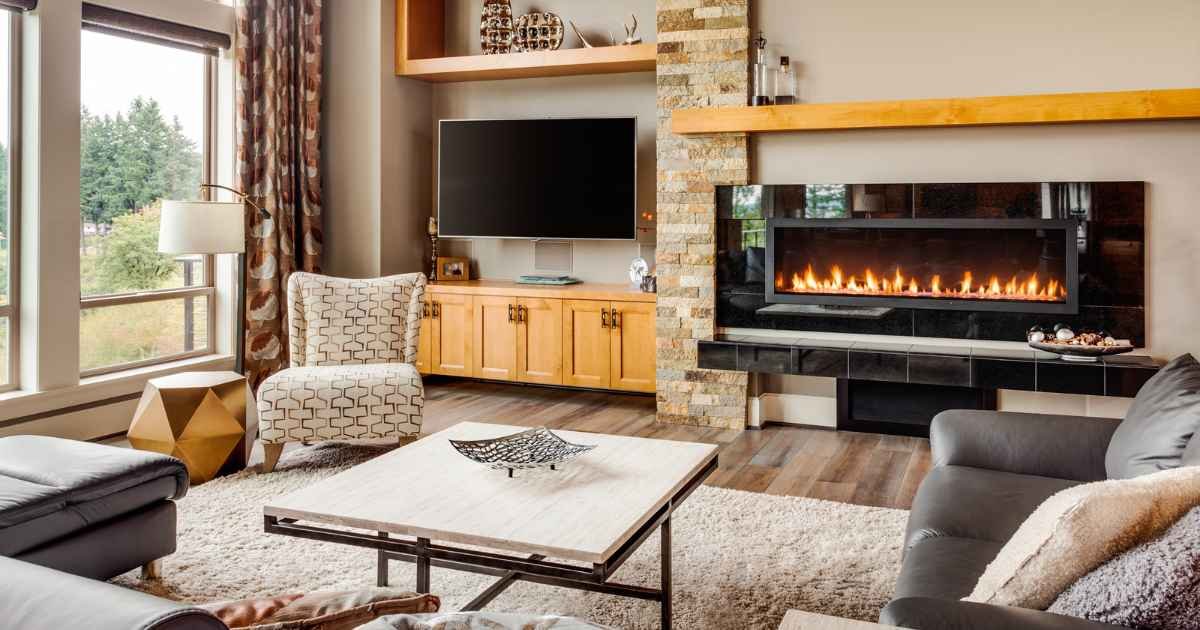 Small living room layout with TV on perpendicular wall and fireplace as primary anchor, warm ivory tones, floating sofa, terracotta rug