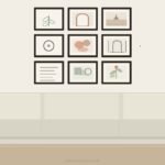 Gallery wall ideas above sofa featuring nine matte black frames in a warm neutral living room with afternoon light